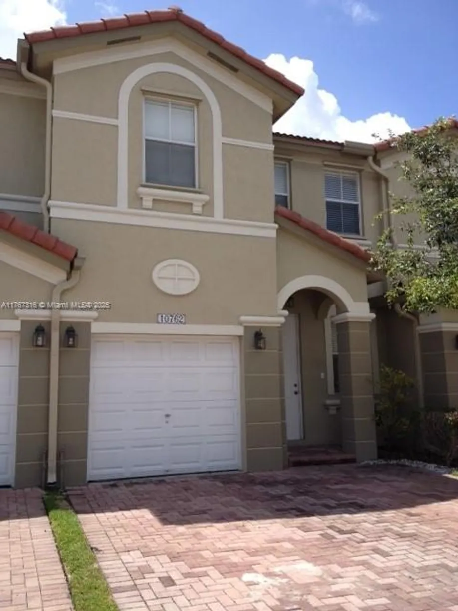 South Florida Real Estate | View 10762 NW 80 Ln | 4 Beds, 2 Baths