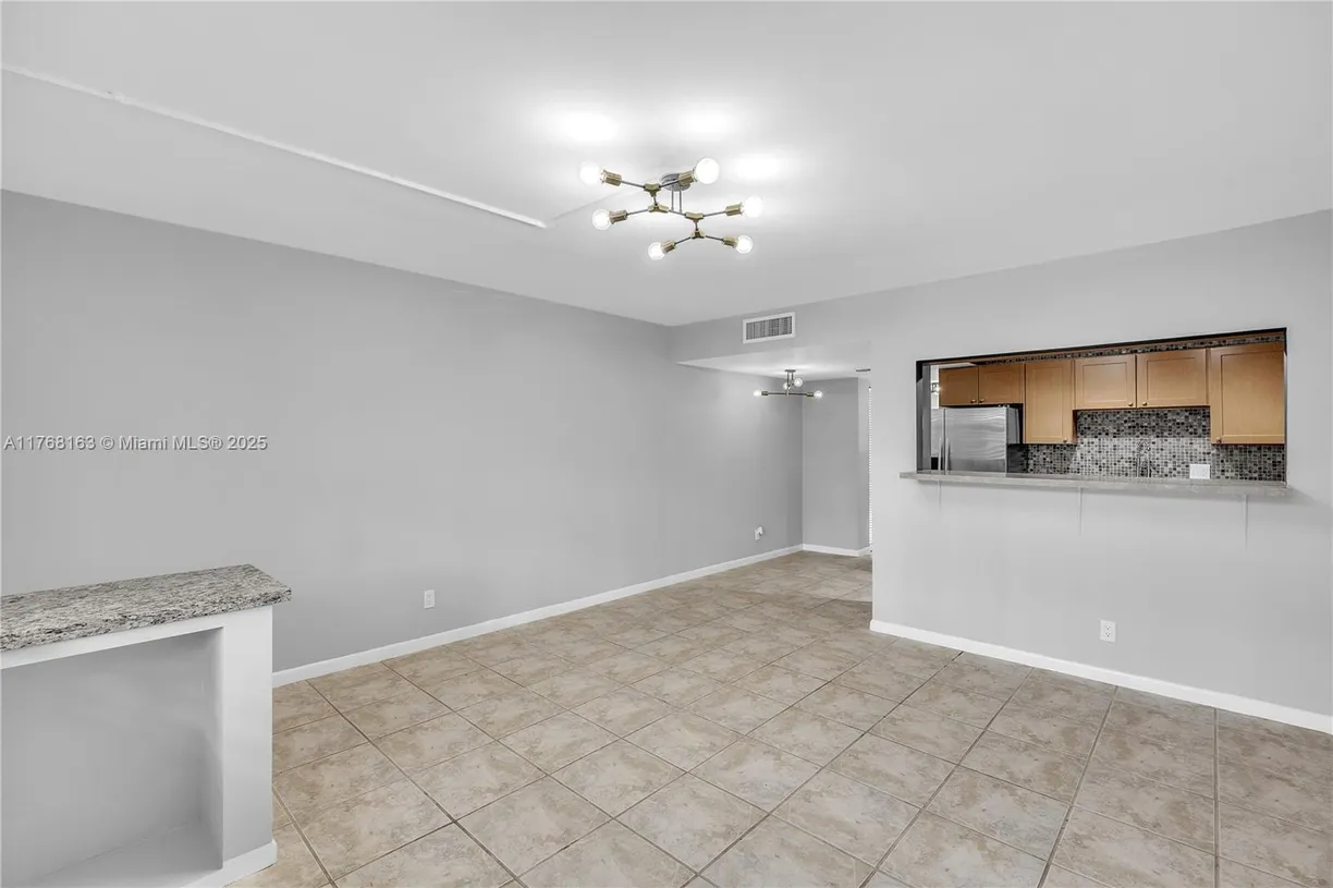 South Florida Real Estate | View 1901 N Andrews Ave, 105 | Listing