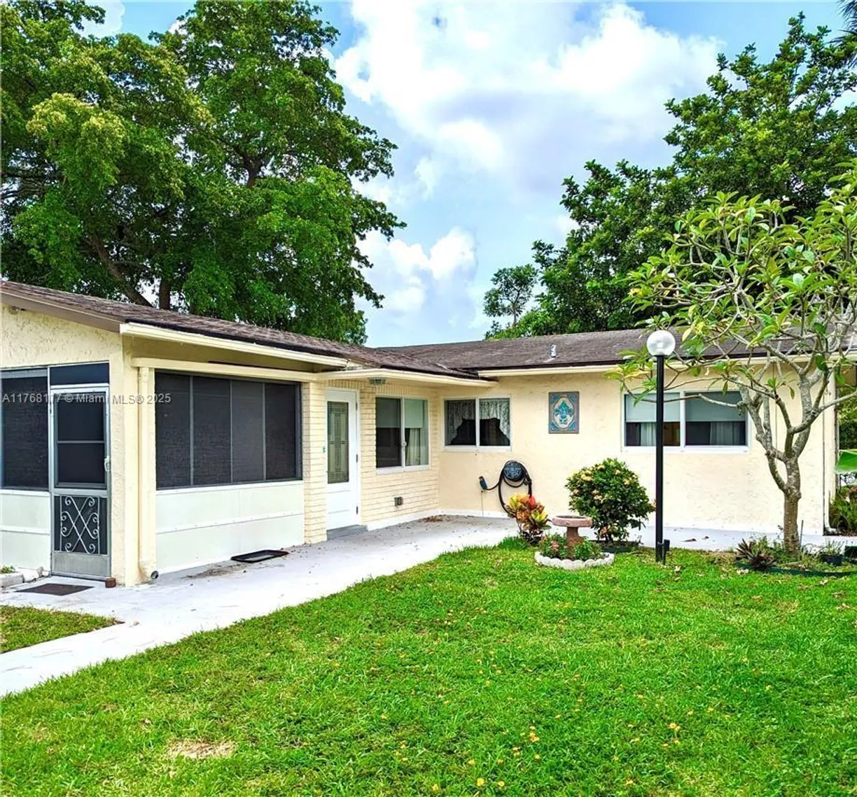 South Florida Real Estate | View 410 SW Natura Avenue | 2 Beds, 1 Bath
