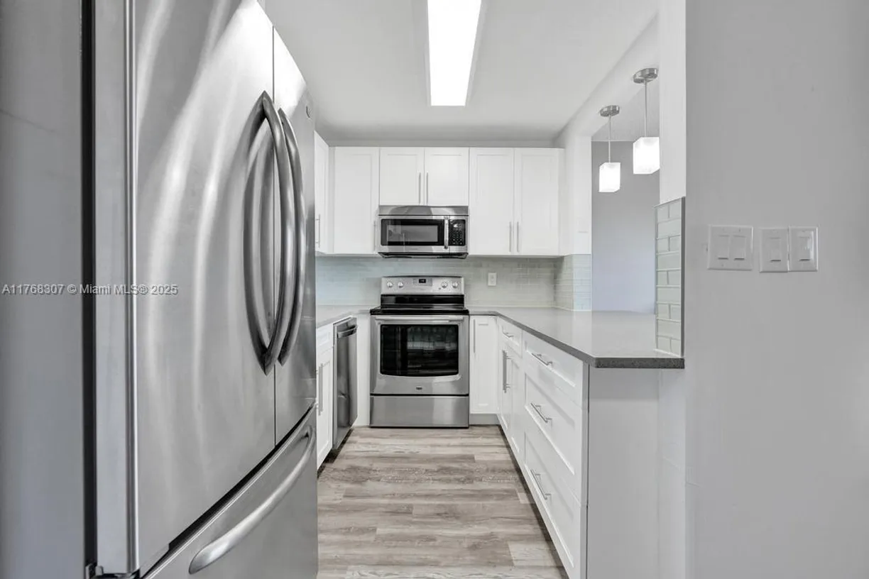 South Florida Real Estate | View 700 Village Green Ct, 319 | Listing