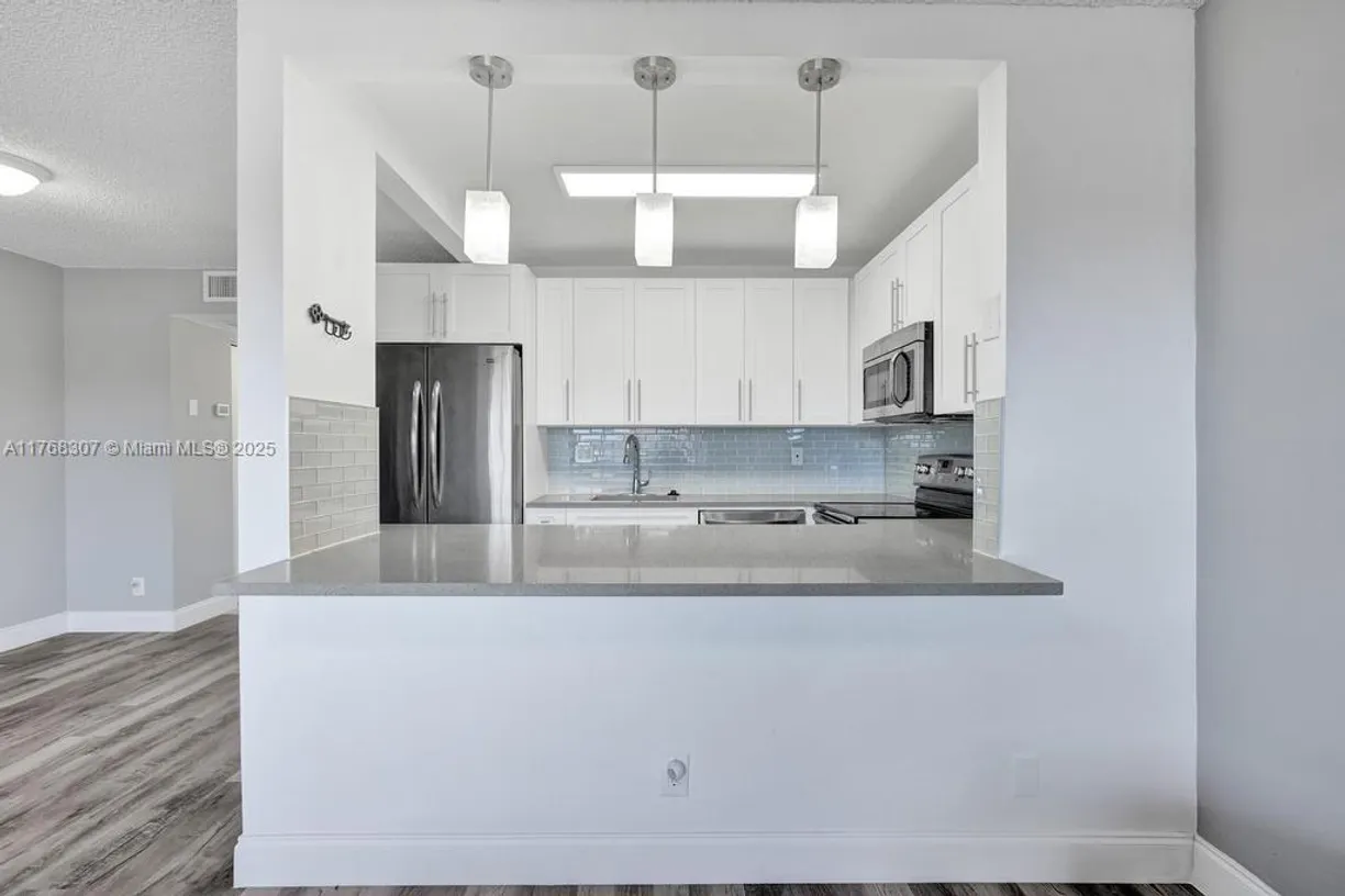 South Florida Real Estate | View 700 Village Green Ct, 319 | Listing