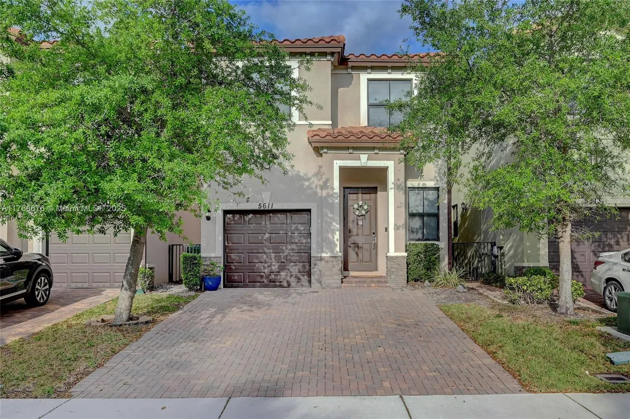South Florida Real Estate | View 5611 NW 50th Ter, 5611 | 4 Beds, 2 Baths