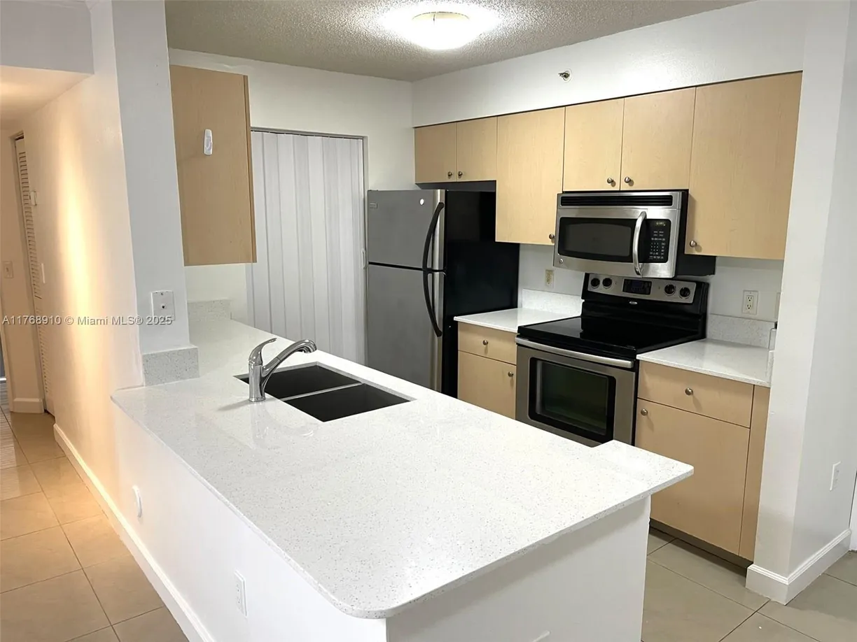 South Florida Real Estate | View 2451 Centergate Dr, 107 | Listing