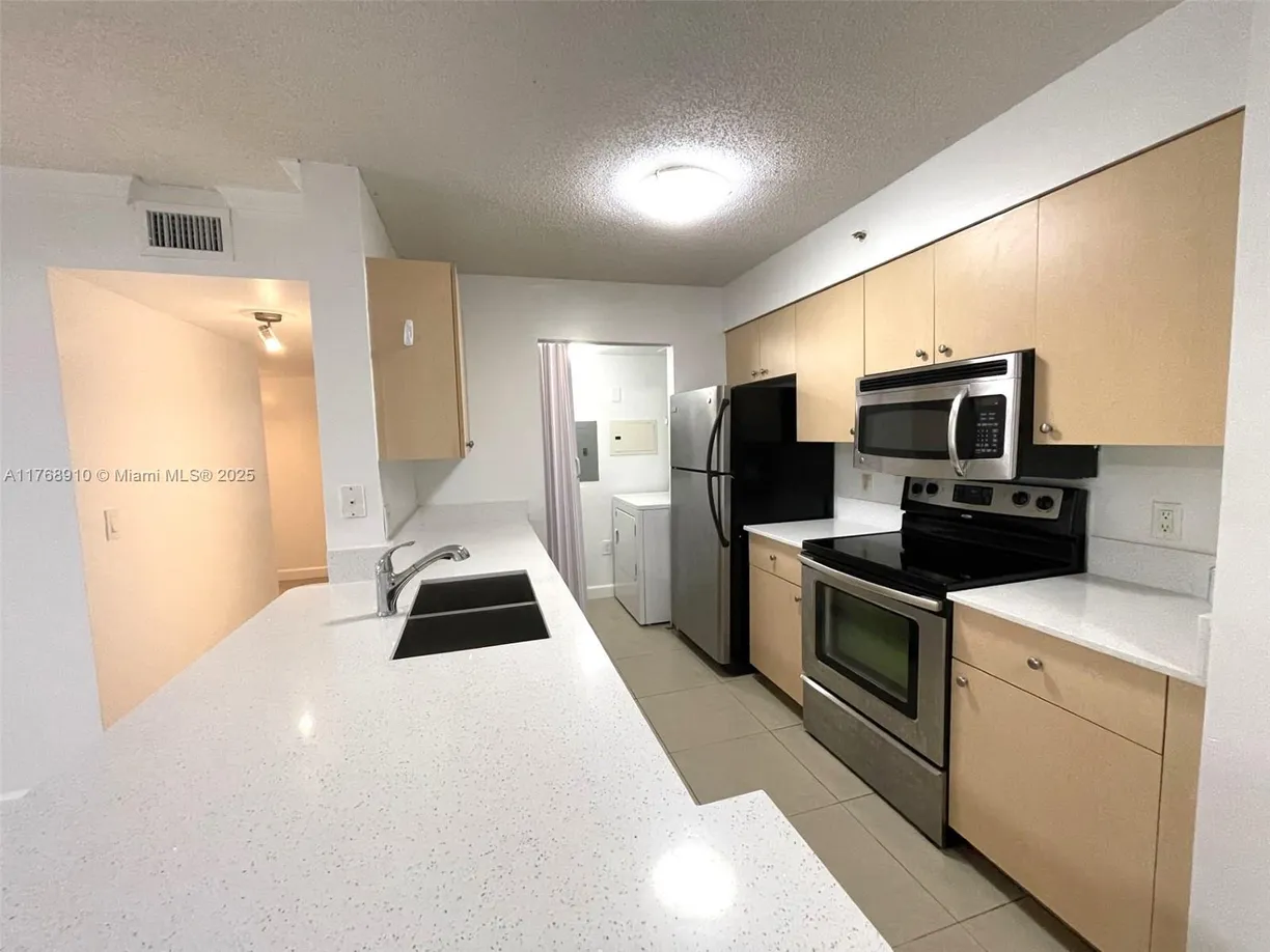 South Florida Real Estate | View 2451 Centergate Dr, 107 | 2 Beds, 1 Bath