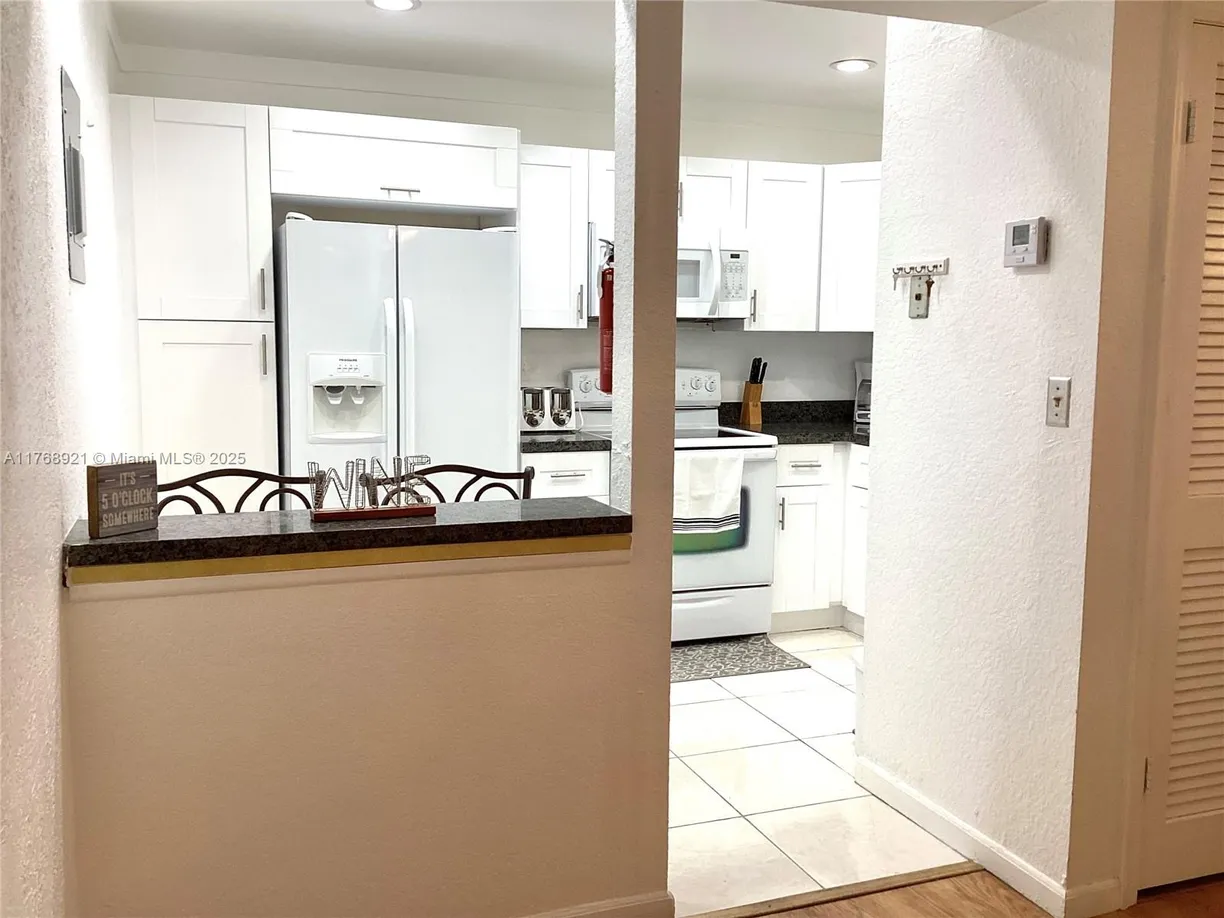 South Florida Real Estate | View 9511 N Hollybrook Lake Dr, 305 | Listing