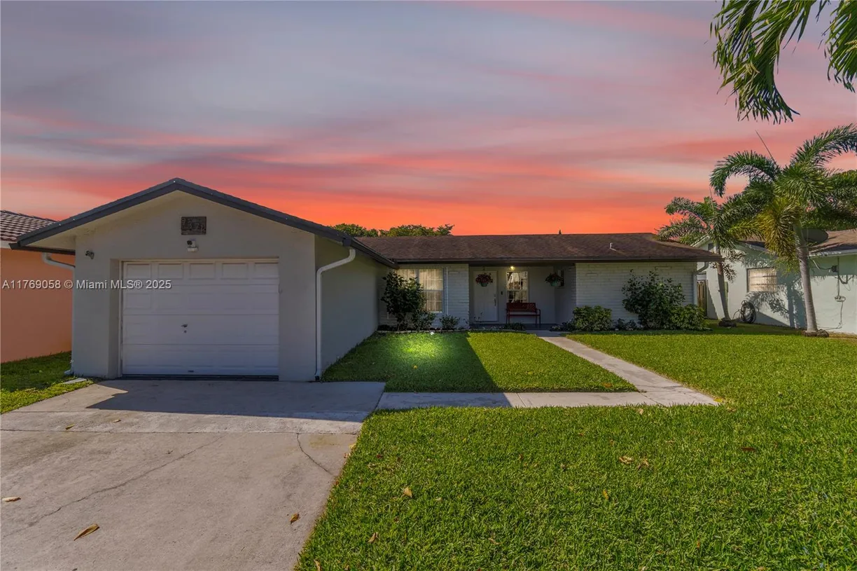 South Florida Real Estate | View 9371 NW 33rd Mnr | 3 Beds, 2 Baths