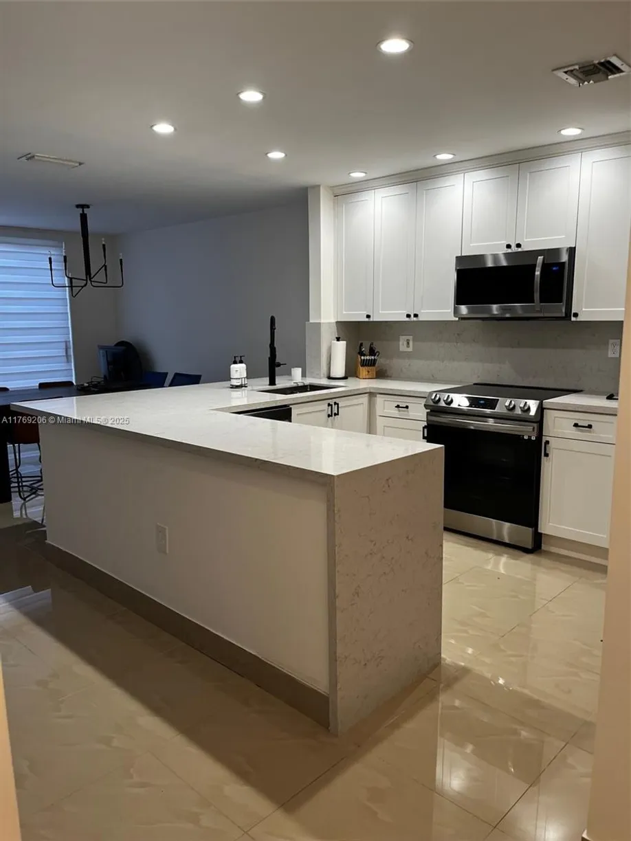 South Florida Real Estate | View 4460 NW 102nd Pl | Listing
