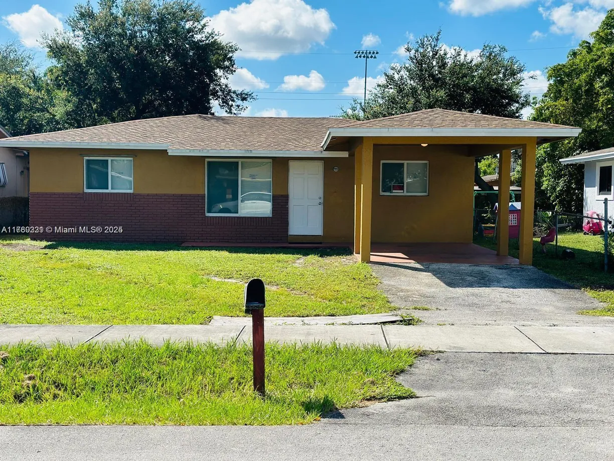 South Florida Real Estate | View 2620 NW 14th Ct | 3 Beds, 2 Baths