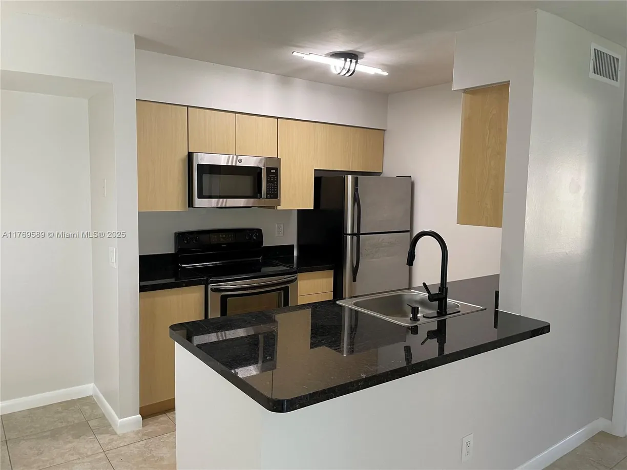 South Florida Real Estate | View 751 NW 104th Ave, 103 | 2 Beds, 2 Baths