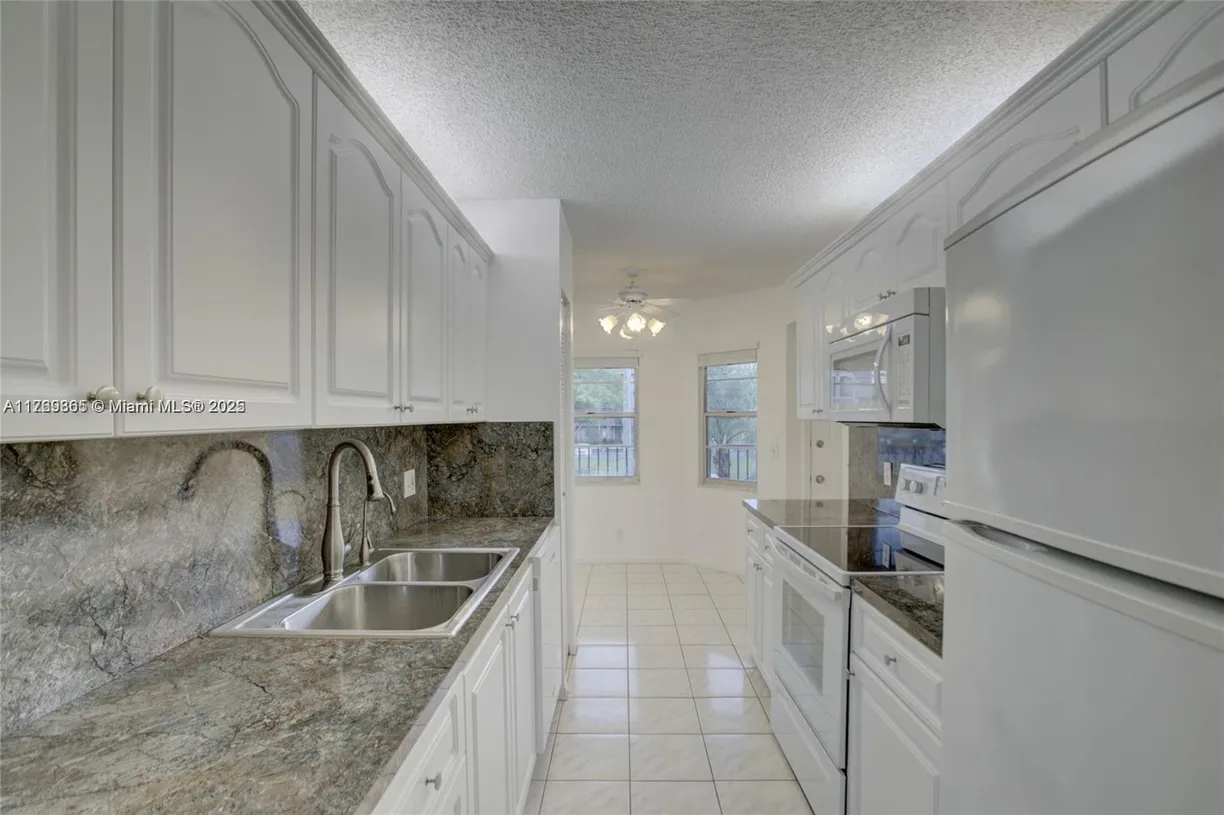 South Florida Real Estate | View 12701 SW 14th St, 203J | Listing
