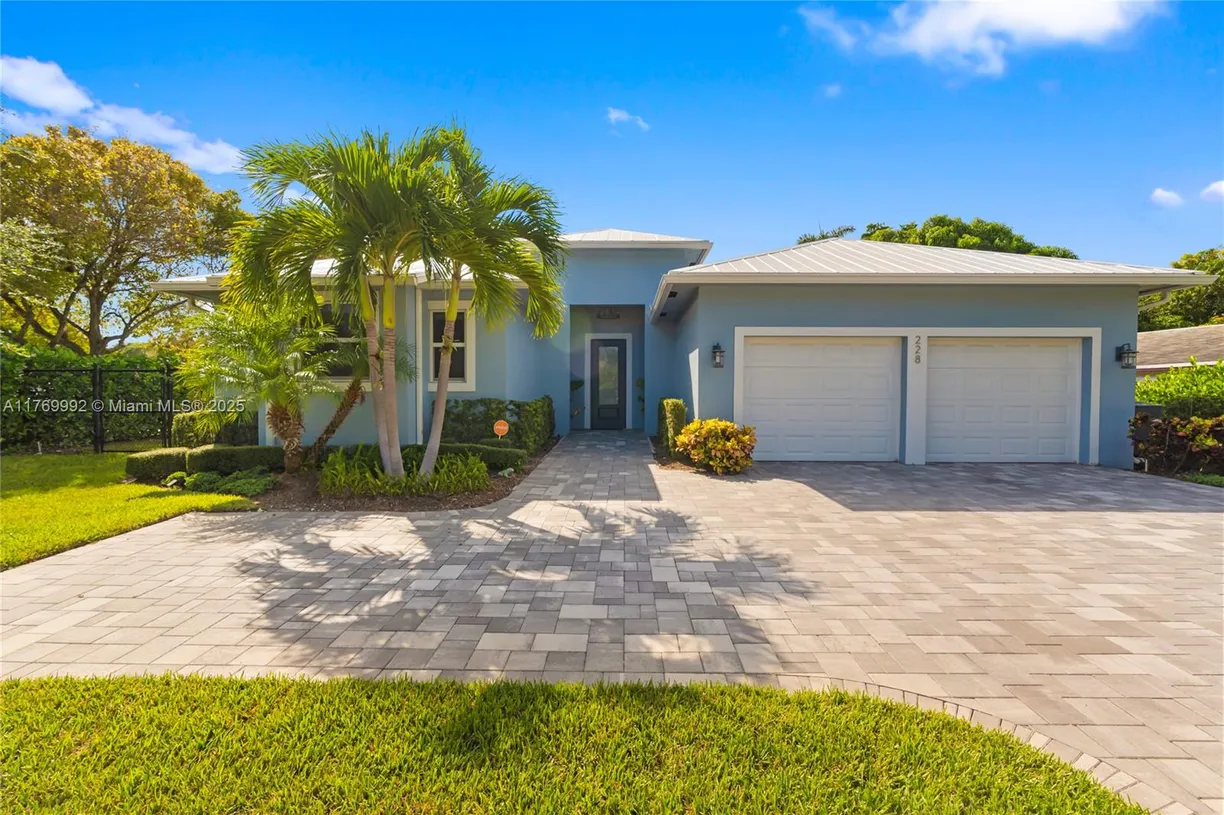 South Florida Real Estate | View 228 SW 4th Ave | 4 Beds, 3 Baths