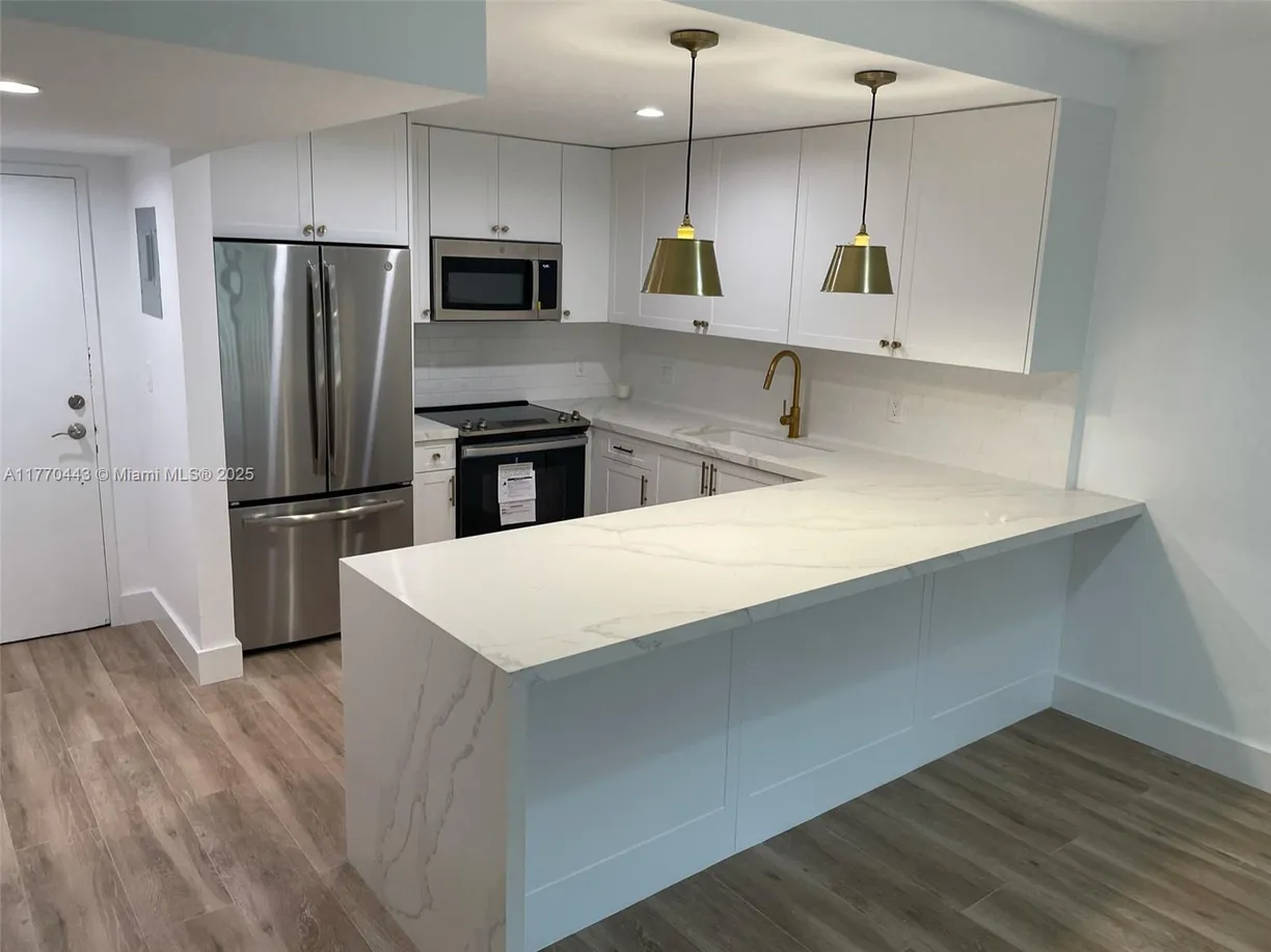 South Florida Real Estate | View 100 Edgewater Dr, 101 | Listing