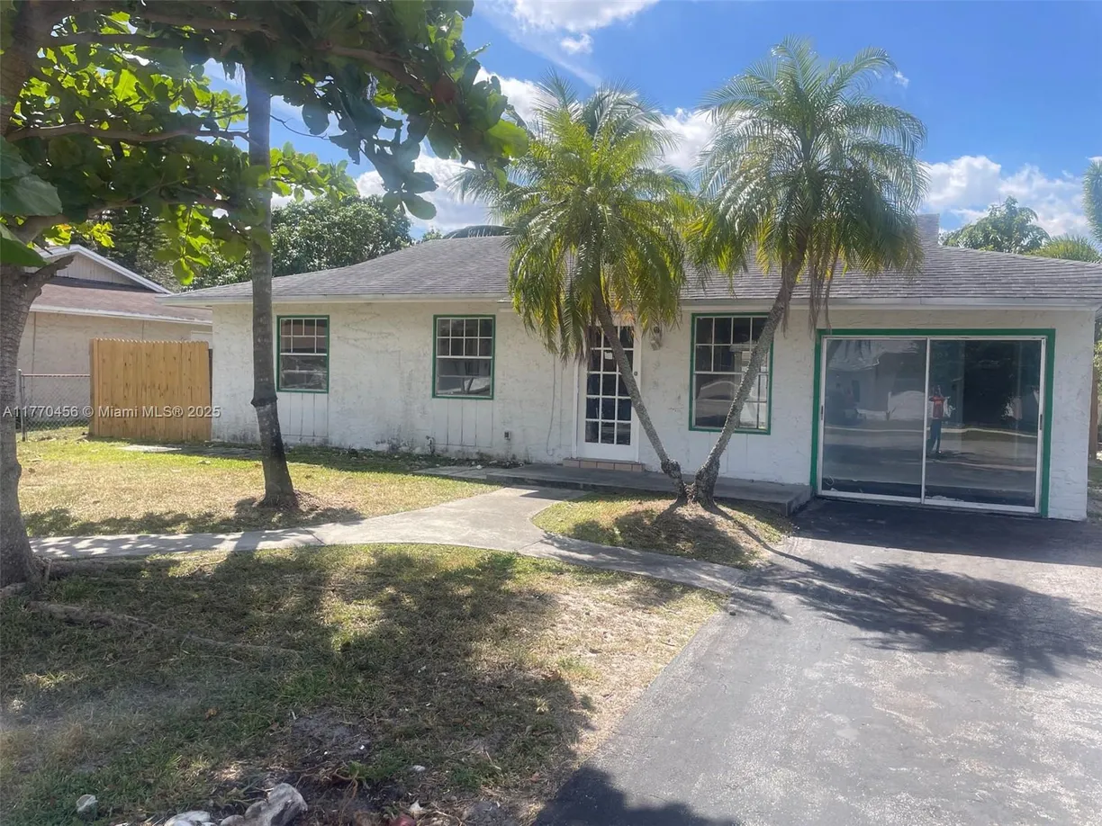 South Florida Real Estate | View 8220 SW 6th St | 3 Beds, 2 Baths