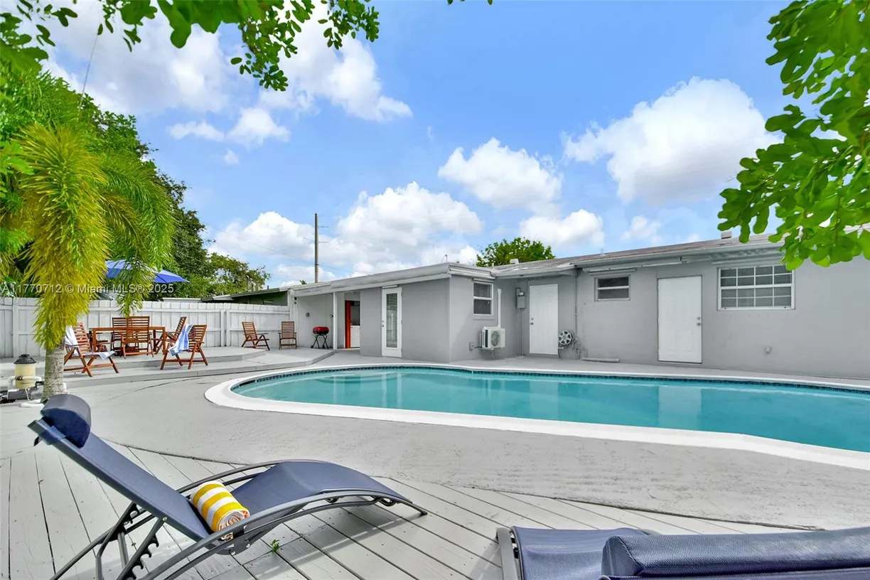 South Florida Real Estate | View 730 N 64th Ave | 4 Beds, 2 Baths