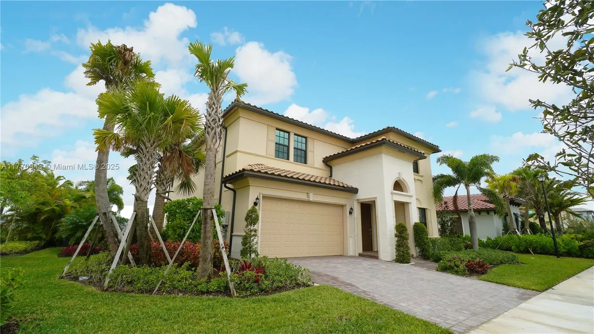 South Florida Real Estate | View 8725 Parkland Bay Dr | 4 Beds, 5 Baths