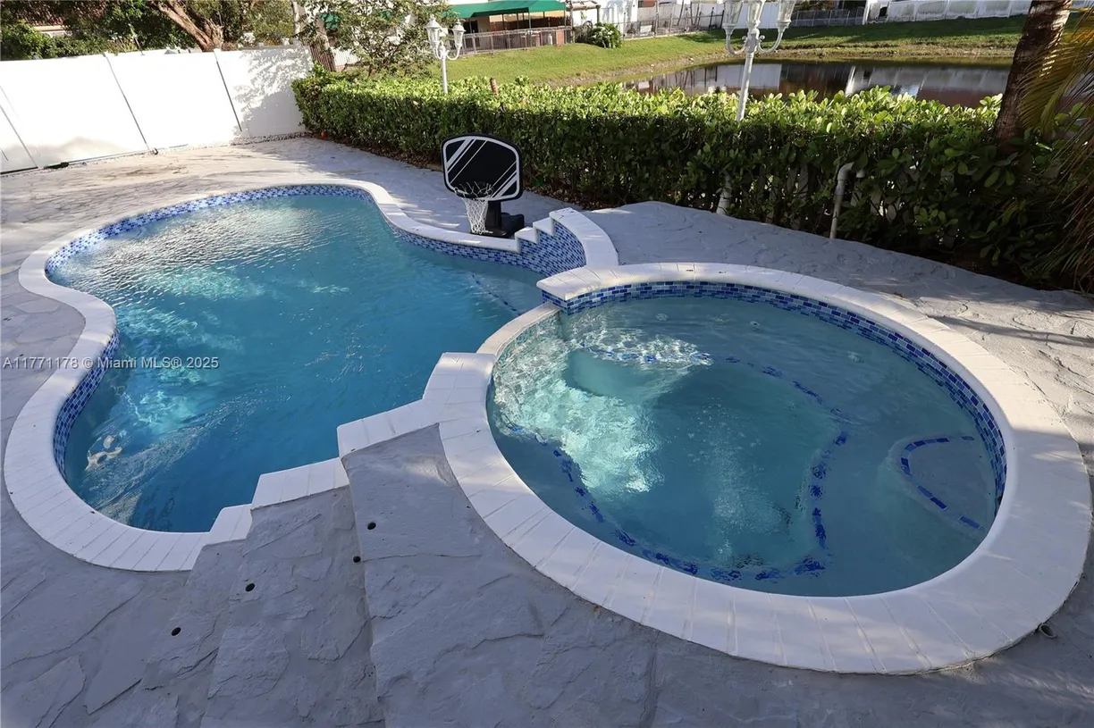 South Florida Real Estate | View 15560 SW 14th St | 6 Beds, 3 Baths