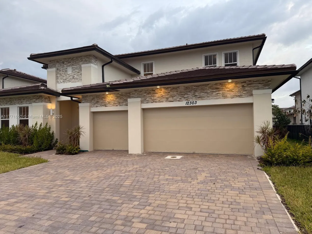 South Florida Real Estate | View 12303 SW 44th St | 4 Beds, 3 Baths