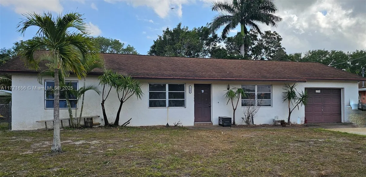 South Florida Real Estate | View 1049 Coral Dr | 3 Beds, 2 Baths