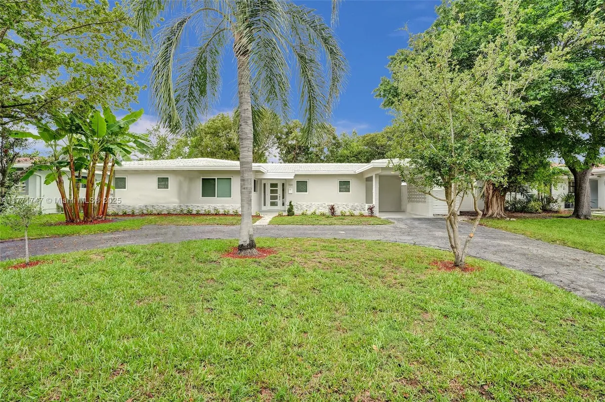 South Florida Real Estate | View 709 NE 25th Ave | 4 Beds, 2 Baths
