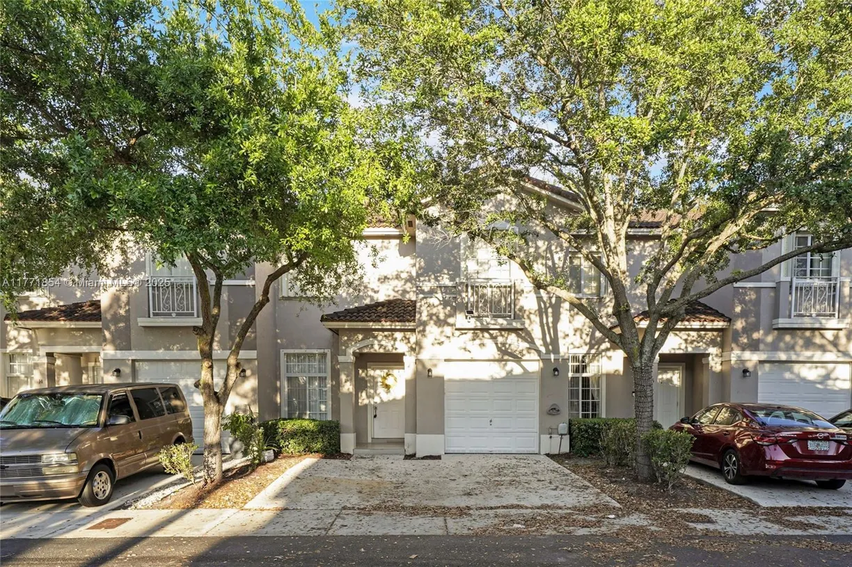 South Florida Real Estate | View 14612 SW 38th St, 15 | 4 Beds, 2 Baths
