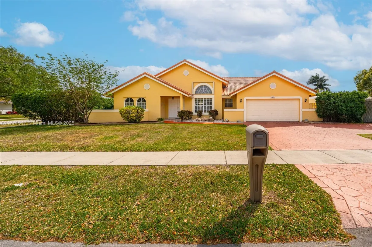South Florida Real Estate | View 1400 SW 54th Ave | 4 Beds, 2 Baths