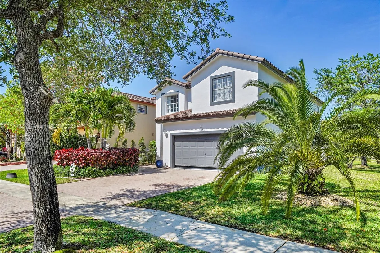 South Florida Real Estate | View 1298 NW 192nd Ter | 4 Beds, 2 Baths