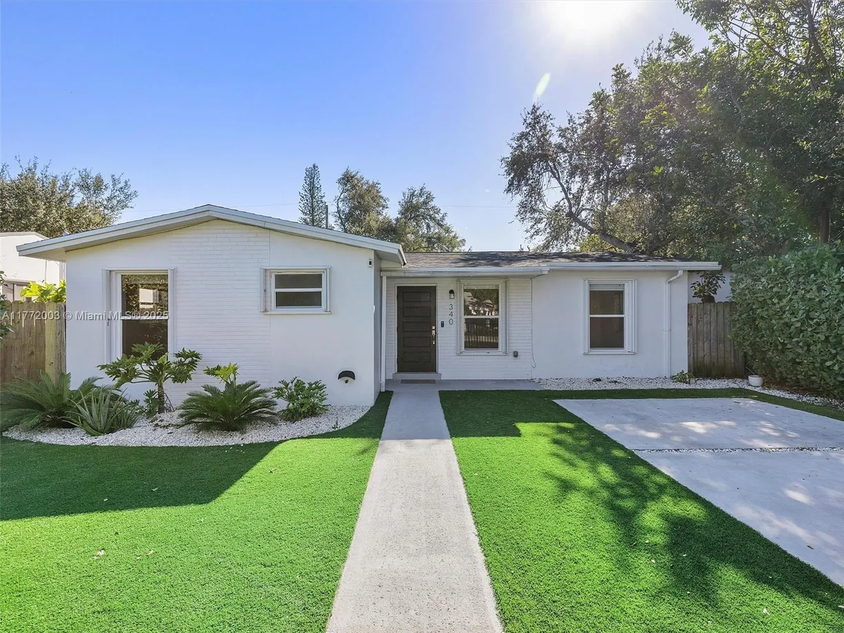 South Florida Real Estate | View 340 NW 45th St | 4 Beds, 2 Baths