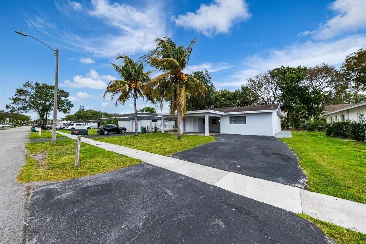 South Florida Real Estate | View 6941 NW 84th St | 3 Beds, 2 Baths