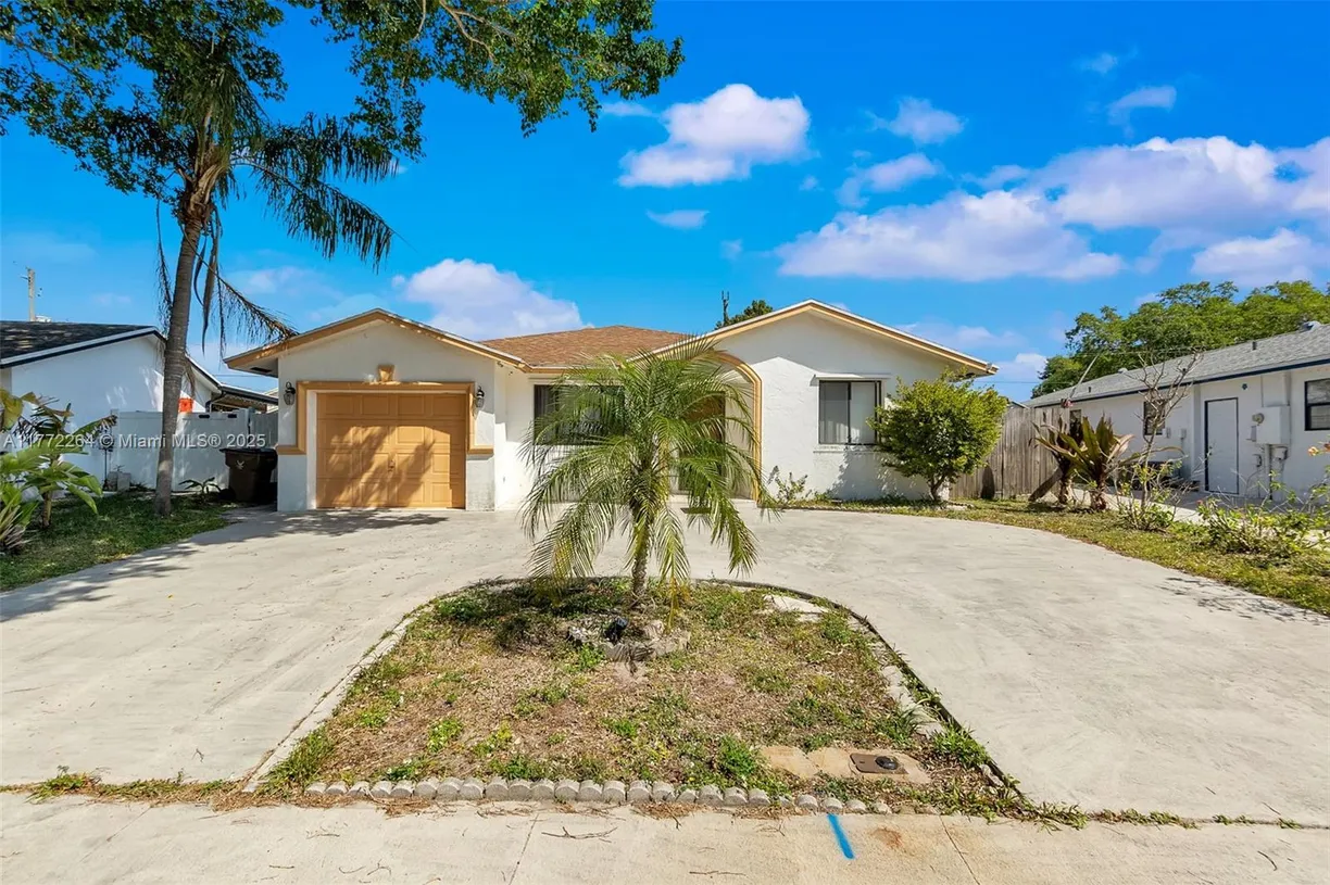 South Florida Real Estate | View 3211 SW 3rd St | 3 Beds, 2 Baths