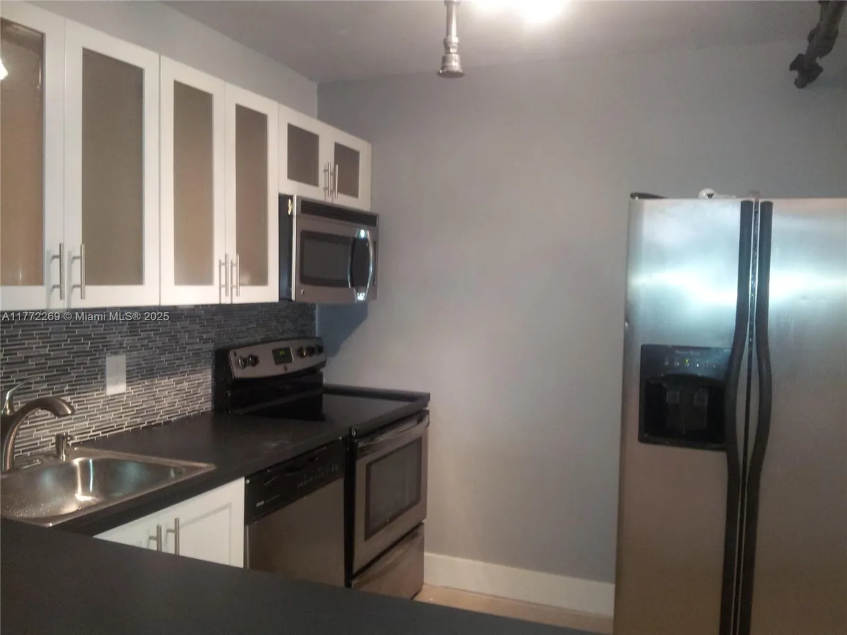South Florida Real Estate | View 1470 NE 123rd St, A204 | 1 Bed, 1 Bath