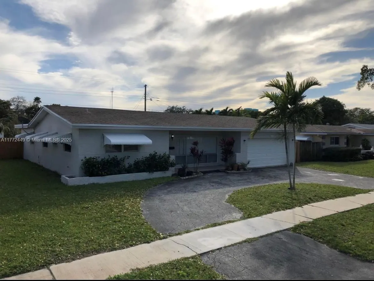 South Florida Real Estate | View 4216 Adams St | 4 Beds, 2 Baths