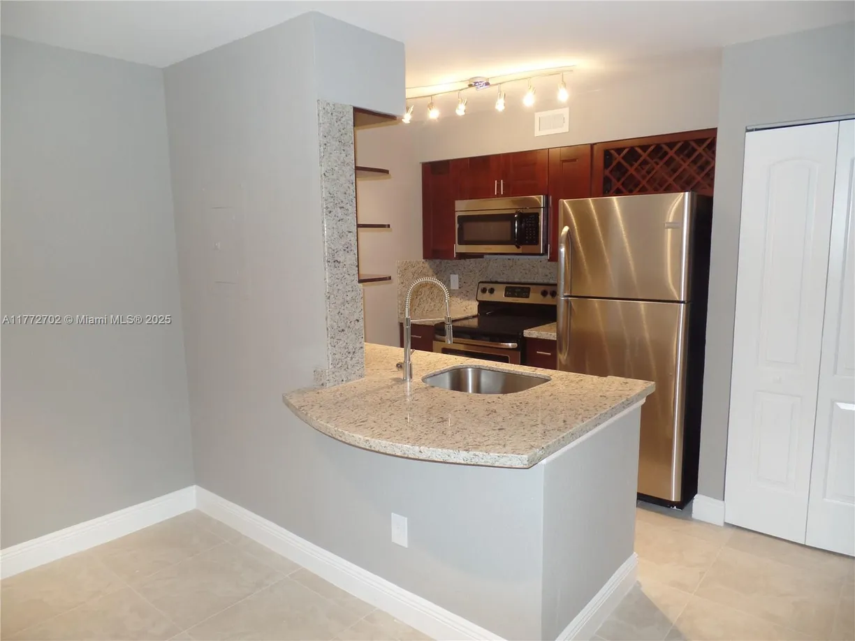 South Florida Real Estate | View 2880 N Oakland Forest Dr, 213 | 1 Bed, 1 Bath