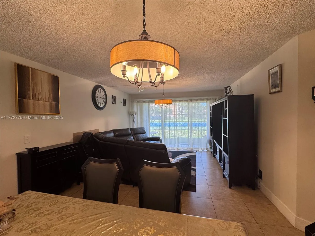 South Florida Real Estate | View 8801 Wiles Rd, 108 | Listing