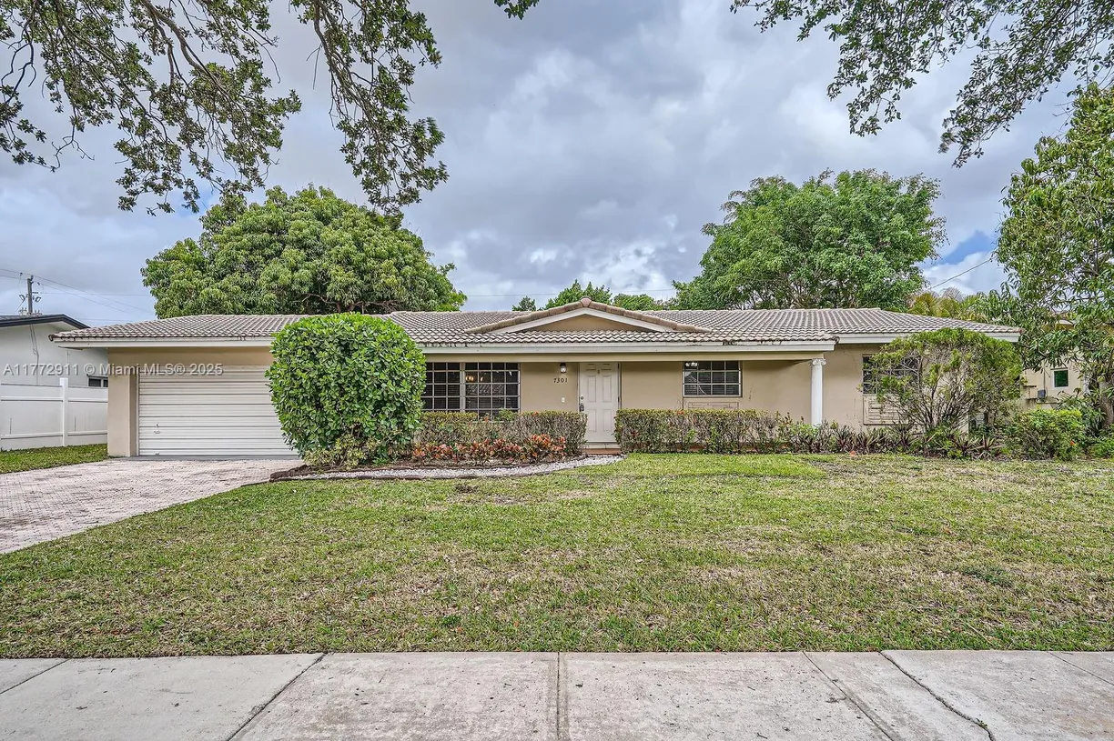 South Florida Real Estate | View 7301 NW 11th St | 3 Beds, 2 Baths
