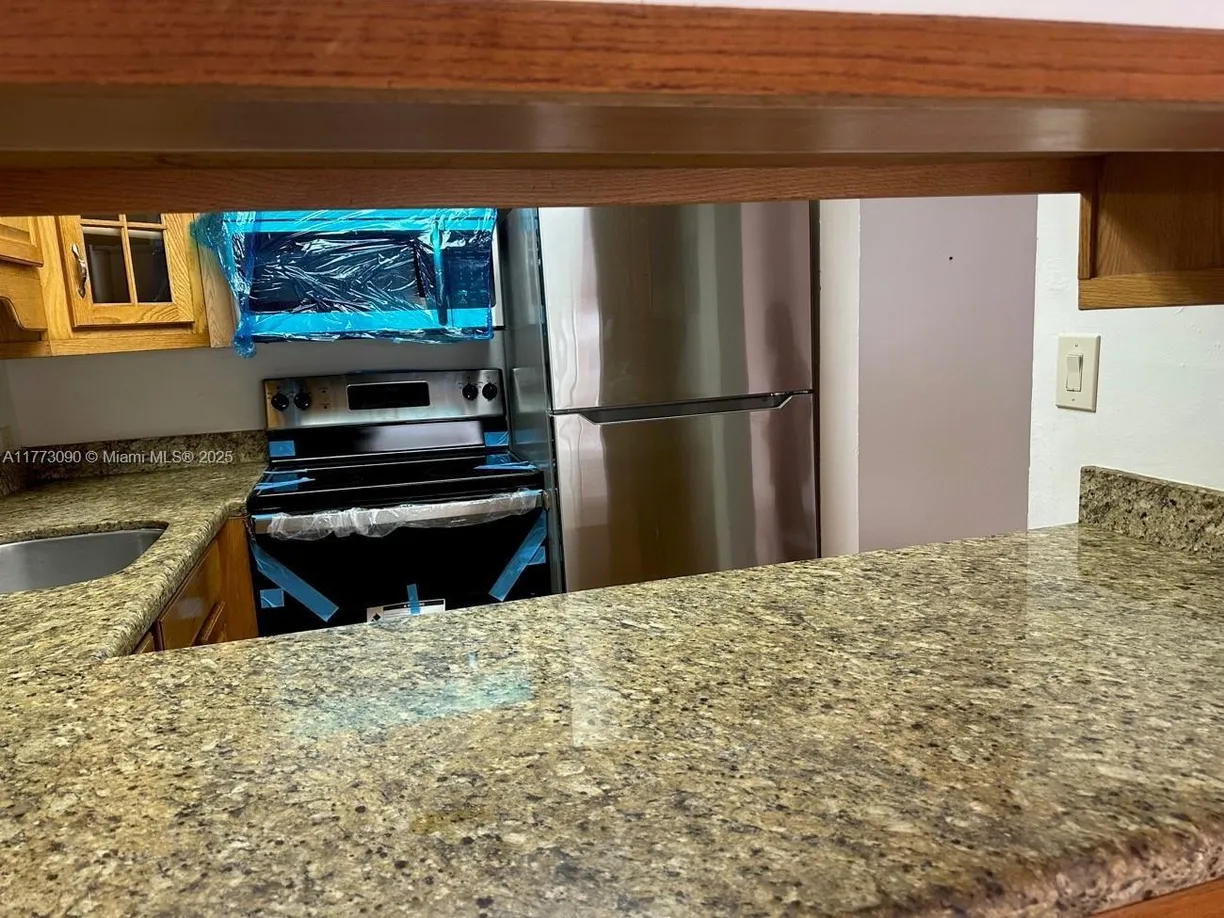 South Florida Real Estate | View 4848 NW 24th Ct, 208 | Listing