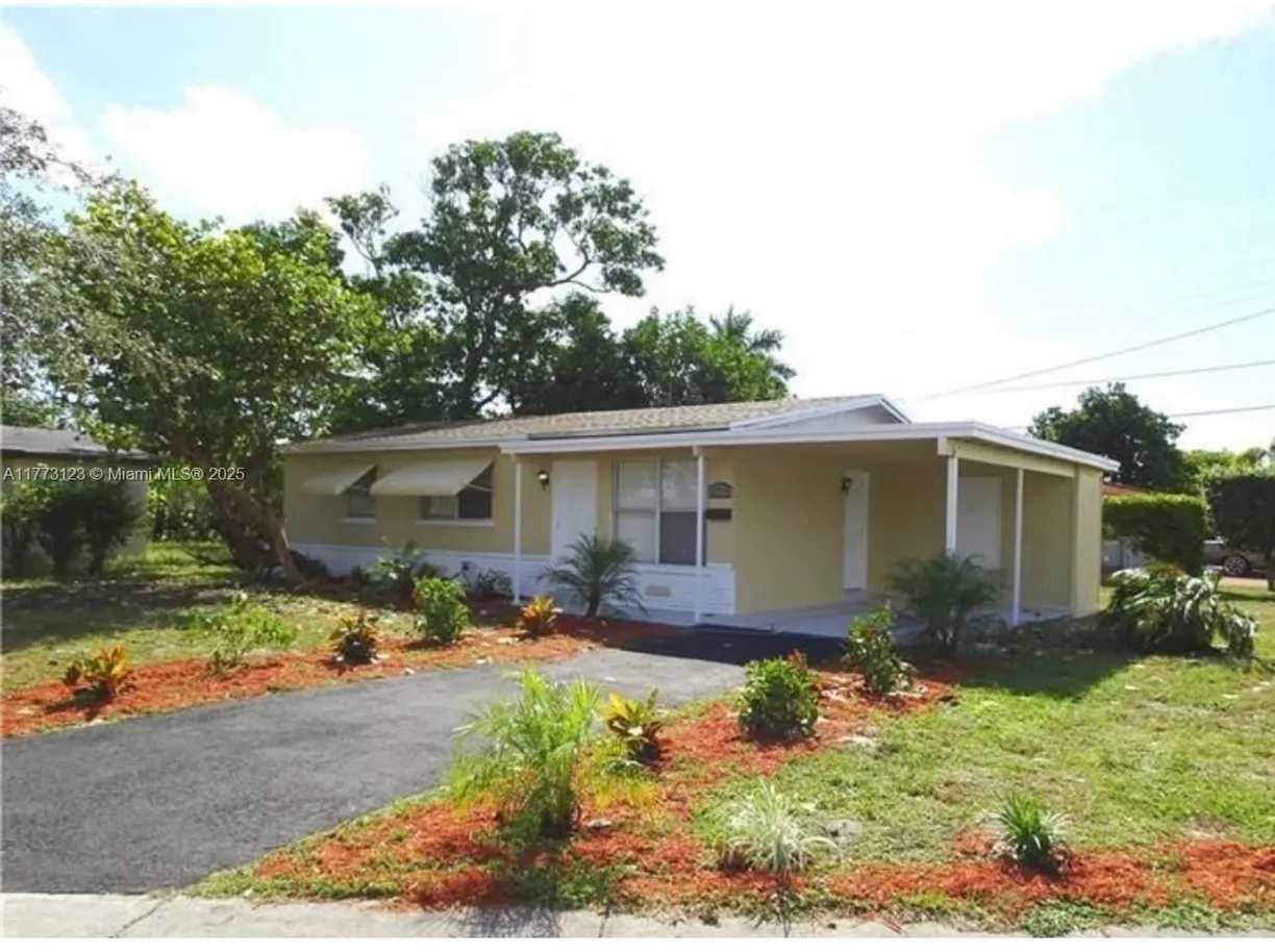 South Florida Real Estate | View 570 NW 18th St | 4 Beds, 2 Baths