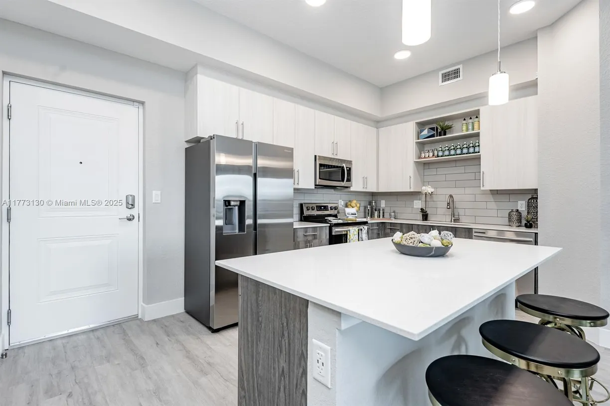 South Florida Real Estate | View 9115 W COMMERCIAL BLVD, 200 | 3 Beds, 3 Baths
