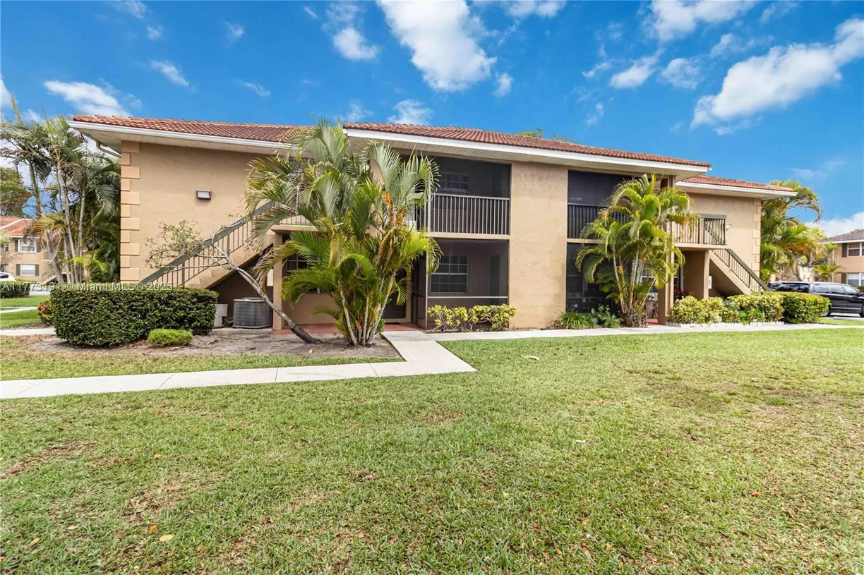 South Florida Real Estate | View 10408 NW 8th St, 103 | 2 Beds, 2 Baths