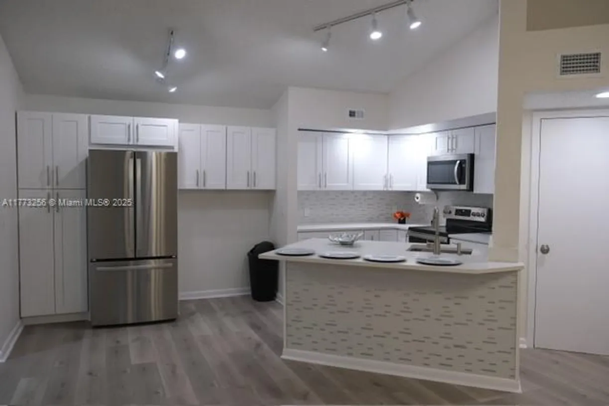 South Florida Real Estate | View 1401 Village Blvd, 137 | 2 Beds, 2 Baths