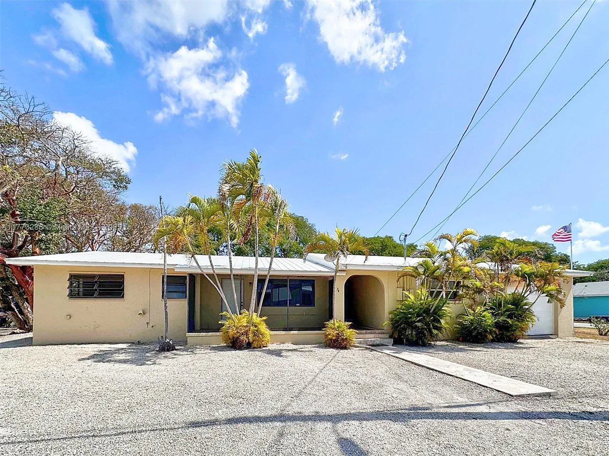 South Florida Real Estate | View 28 Bonefish Ave | 4 Beds, 3 Baths