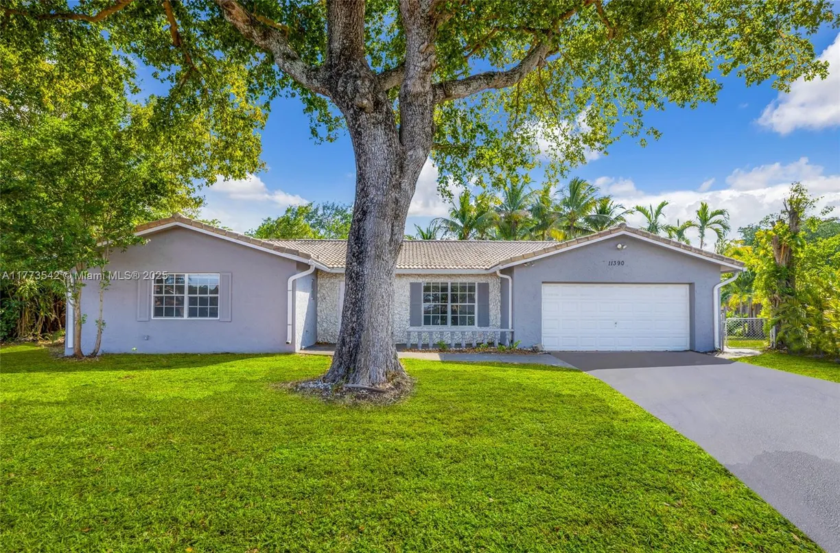 South Florida Real Estate | View 11390 NW 37th St | 4 Beds, 2 Baths