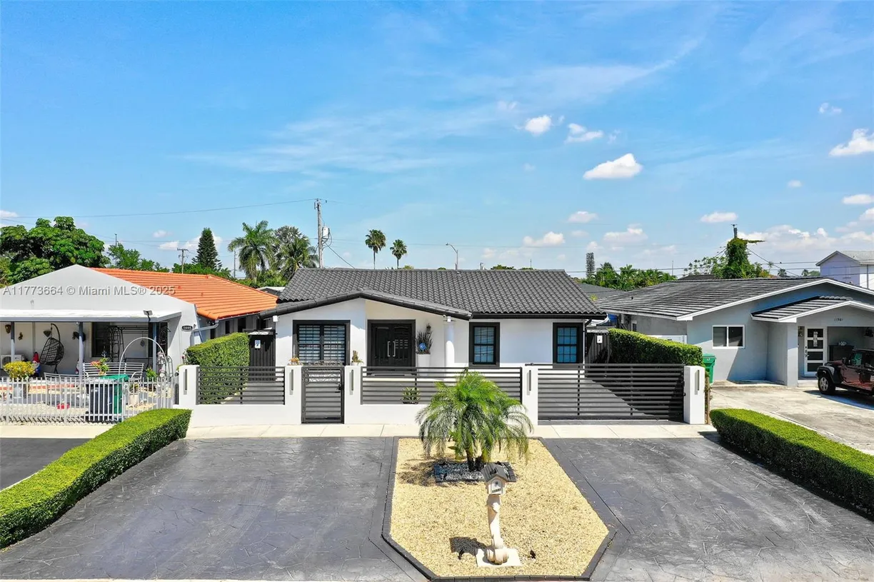 South Florida Real Estate | View 11991 SW 7th St | 3 Beds, 3 Baths