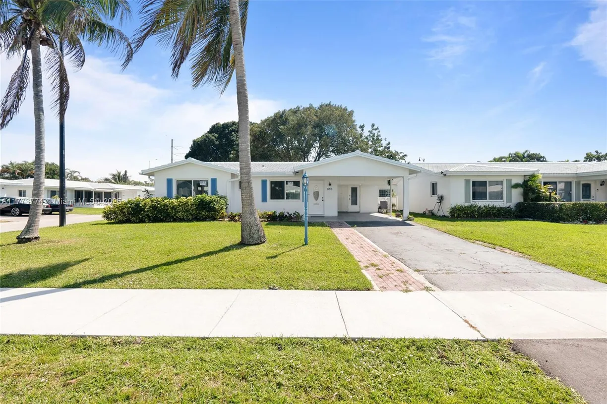 South Florida Real Estate | View 310 Leisure Blvd | 2 Beds, 2 Baths