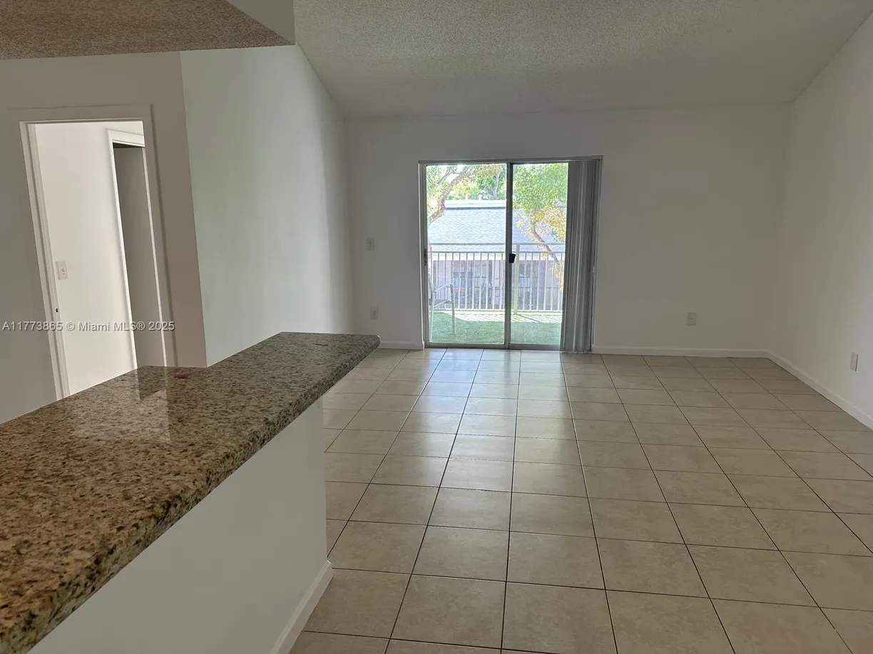 South Florida Real Estate | View 18890 NW 57th Ave, 304 | 2 Beds, 2 Baths