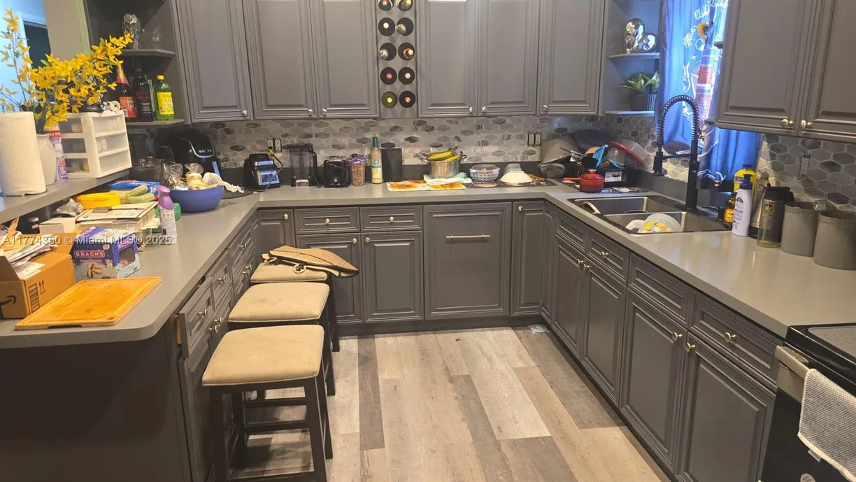 South Florida Real Estate | View 295 NW 29th Ave | 3 Beds, 2 Baths