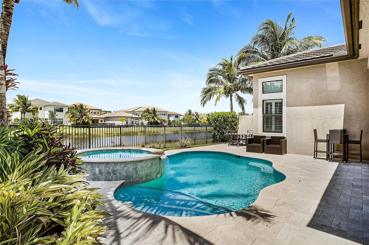 South Florida Real Estate | View 9338 Eden Roc Ct | 4 Beds, 3 Baths
