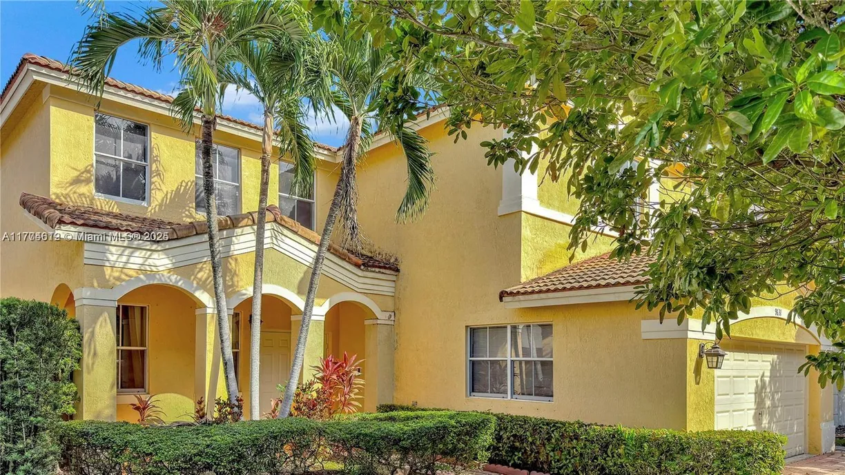 South Florida Real Estate | View 9631 NW 45th St | 4 Beds, 3 Baths