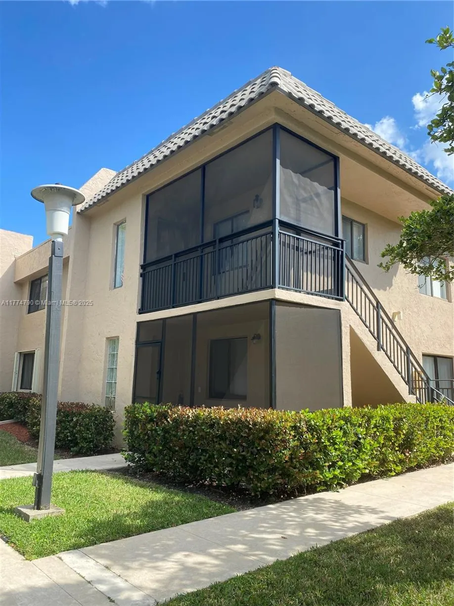South Florida Real Estate | View 360 Racquet Club Rd, 104 | 2 Beds, 2 Baths