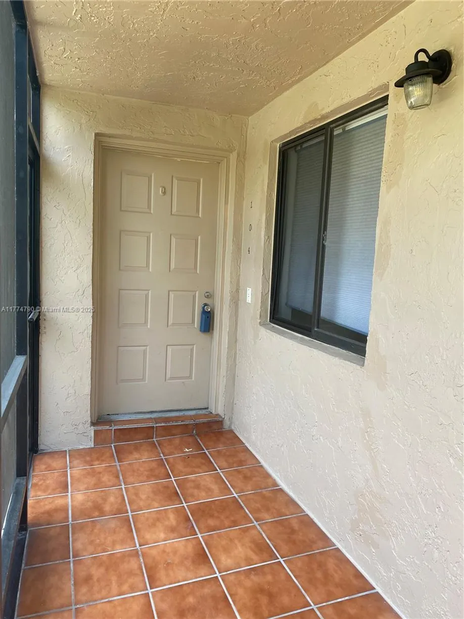 South Florida Real Estate | View 360 Racquet Club Rd, 104 | Listing