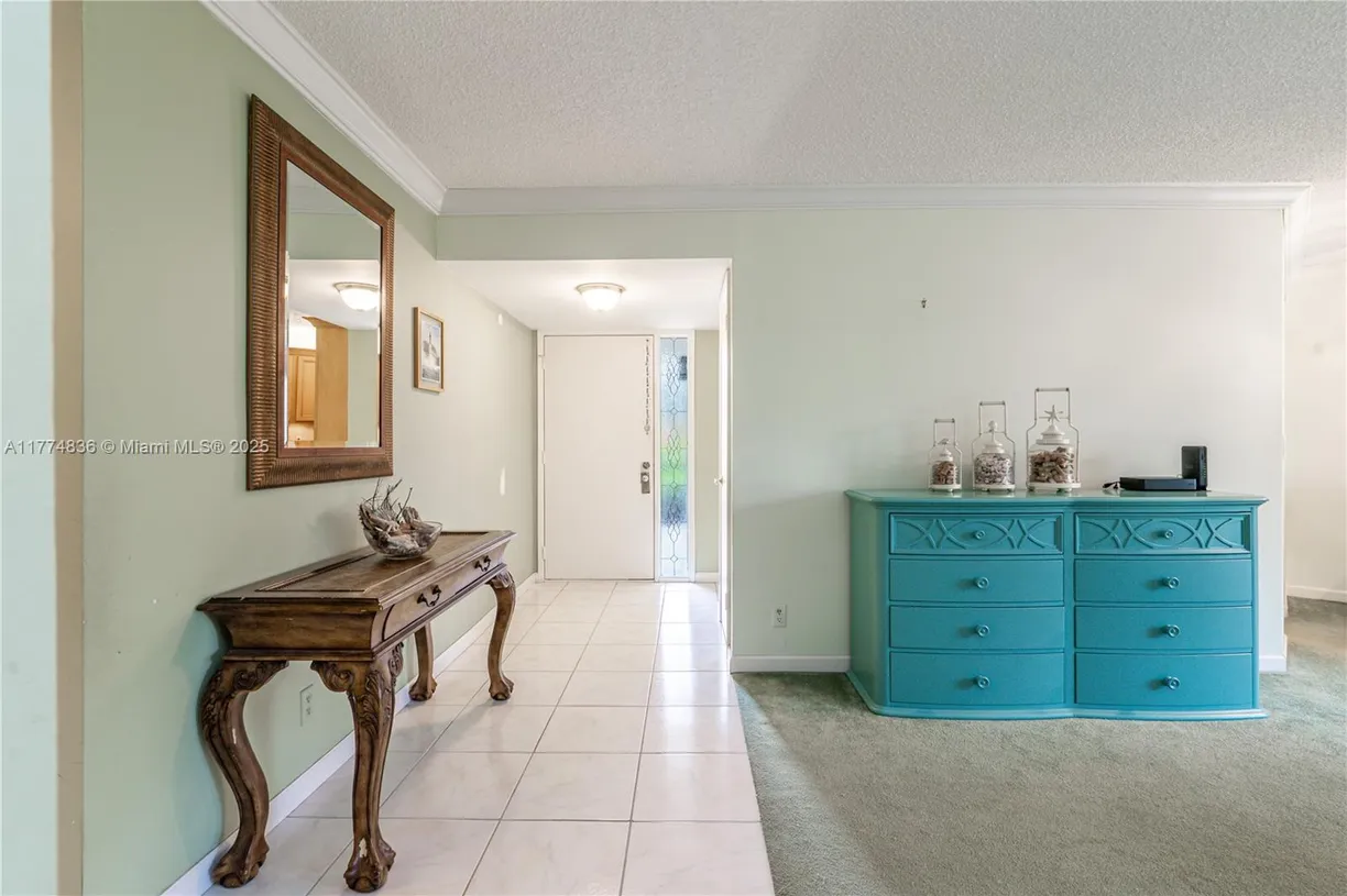 South Florida Real Estate | View 5750 Camino Del Sol, 103 | Listing